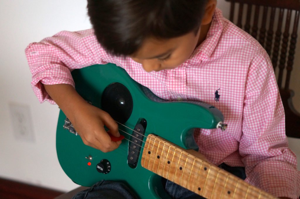 Kids Learn How to Play Guitar Lessons in 10 Steps Children in Homes